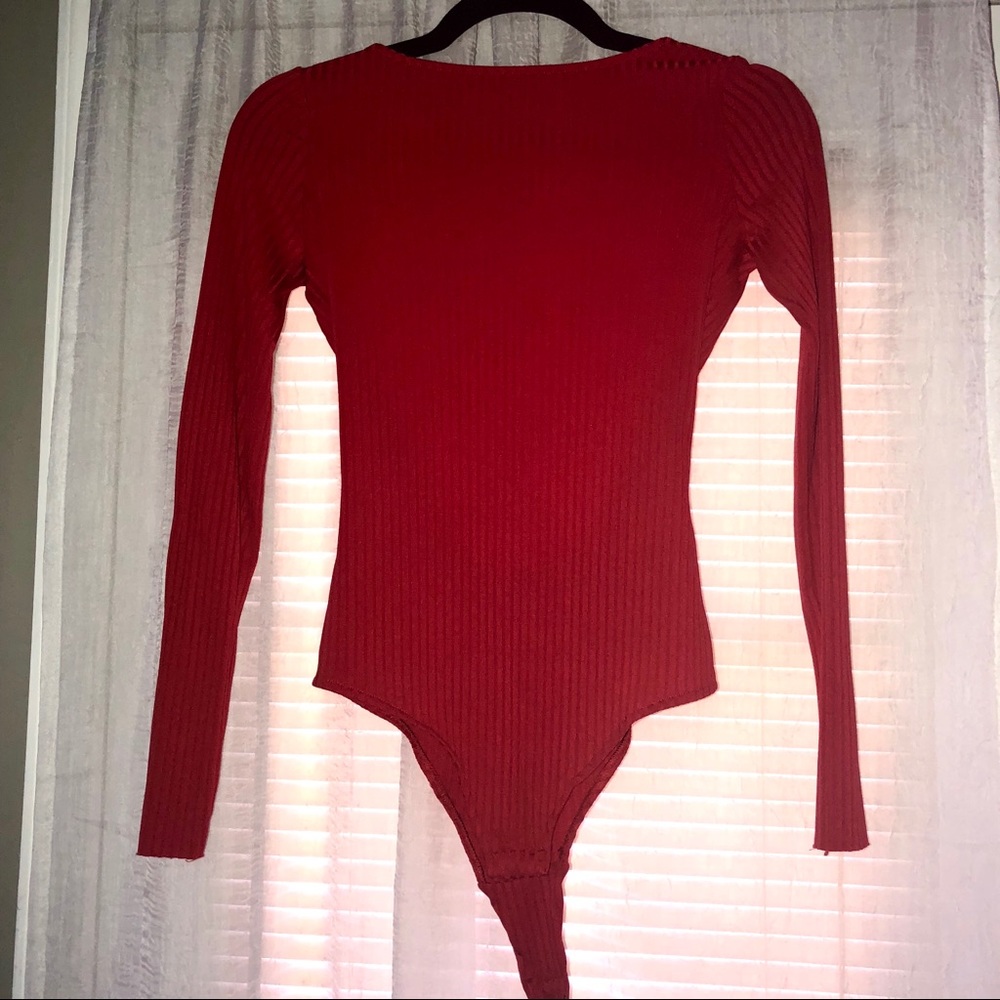 Red long sleeve body suit
